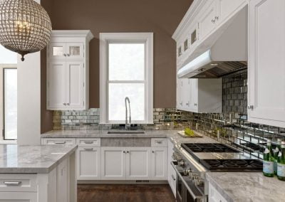 Modern kitchen with white cabinetry, quartz countertops, stainless steel appliances, and a large crystal chandelier.