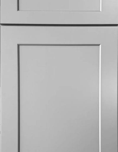 Gray shaker-style cabinet door with a rectangular recessed panel and clean, simple lines.