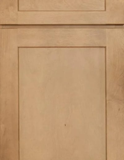 Light wood cabinet door with a simple, rectangular recessed panel and clean, smooth finish.