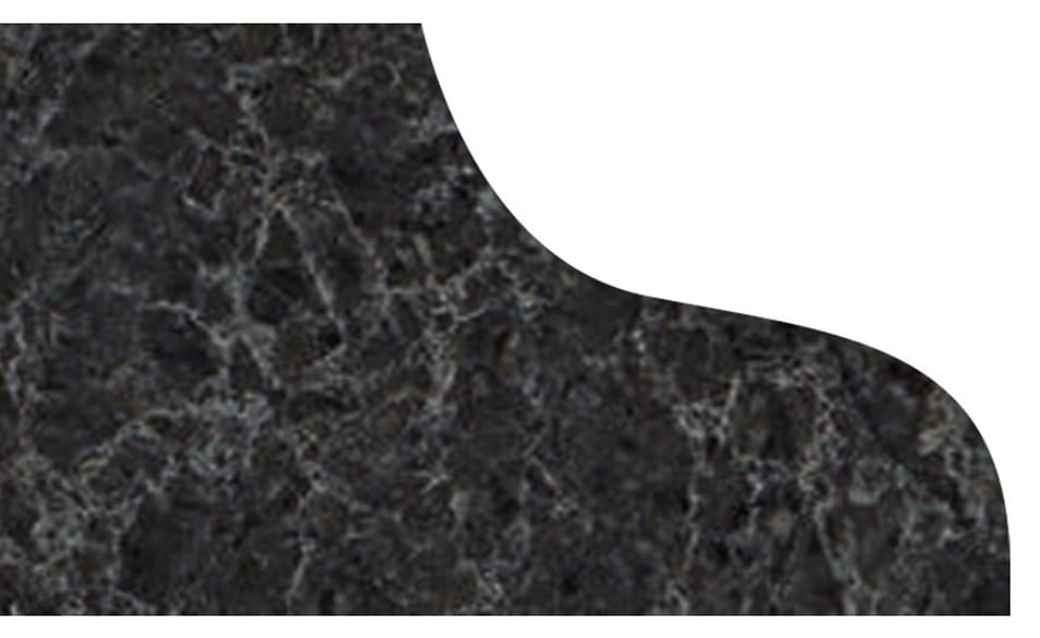 odgee Curved edge of a dark gray marble countertop with light gray veining on a white background.