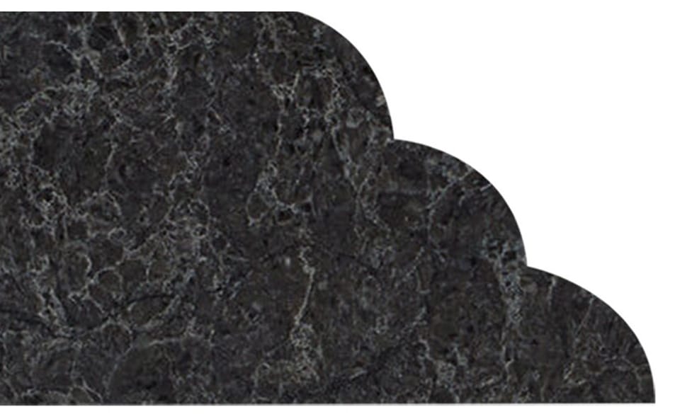 waterfall Dark gray marble slab with a scalloped edge on a white background.