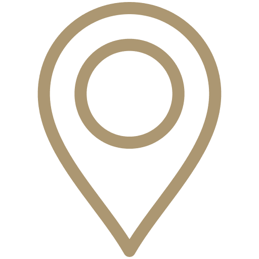 location A simple brown map pin or location marker icon on a light gray background.